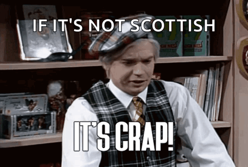Man in Plaid Vest and Tie Saying If It's Not Scottish It's Crap