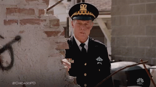Man in Police Uniform at Brick Wall #chicagopd