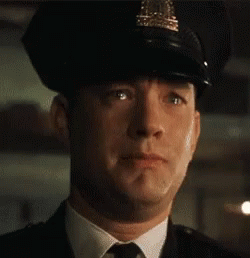 Man In Police Uniform Making Funny Face GIF