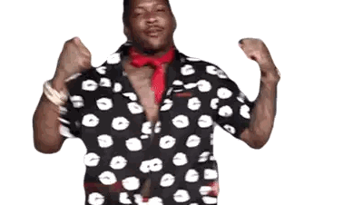 Man in Polka Dot Shirt and Red Tie Flexing