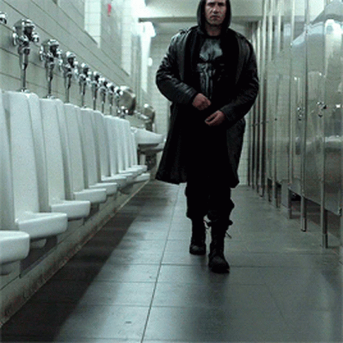 Man in Punisher Shirt Walking