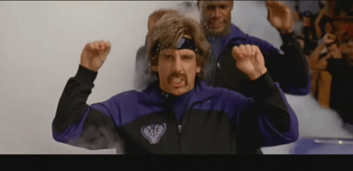 Man in Purple and Black Ravens Jacket