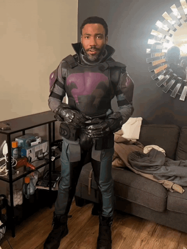 Man in Purple and Black Suit Facing Mirror