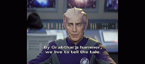 Man In Purple And Gray Uniform By Grabthar's Hammer We Live To Tell The Tale GIF