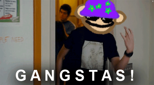 Man in Purple Hat and Sunglasses at Gangsta's Sign