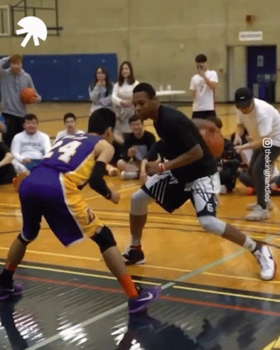 Man In Purple Jersey Dribbling Basketball GIF