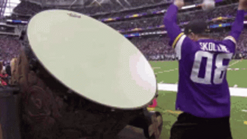 Man In Purple Jersey Number 08 On Football Field GIF