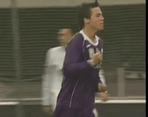 Man In Purple Jersey Running GIF
