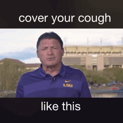 Man in Purple LSU Shirt Talking