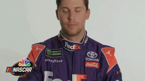 Man in Purple Orange Racing Suit Funny Face