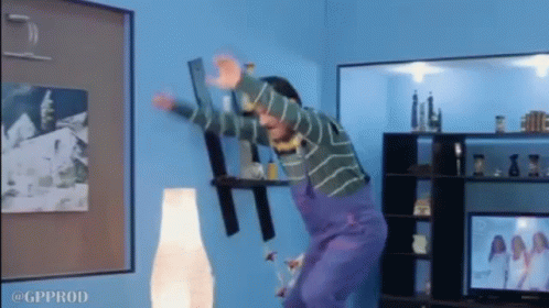 Man in Purple Overalls Jumping gpprod