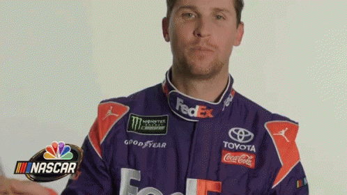 Man in Purple Red Racing Suit FedEx Logo