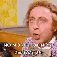 Man in Purple Shirt and Bow Tie on Phone Saying No More Testing