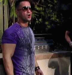 Man in Purple Shirt and Sunglasses by Pool