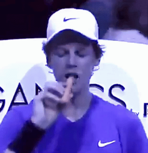 Man In Purple Shirt And White Nike Hat GIF