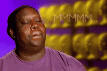 Man in Purple Shirt Making Funny Face
