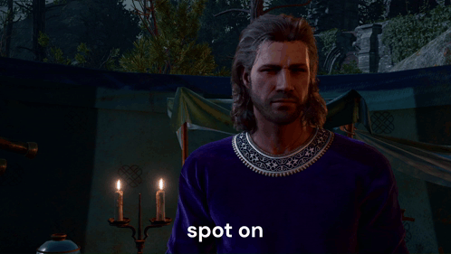 Man in Purple Shirt Pointing to Nose With Spot On Text