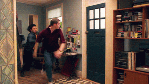 Man in Purple Shirt Running