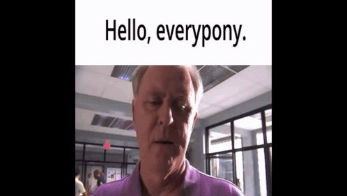Man in Purple Shirt Saying Hello Everyone
