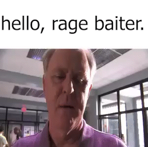 Man in Purple Shirt Saying Hello, Rage Baiter