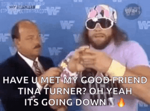 Man In Purple Shirt Talking To Suit GIF