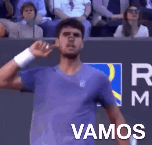 Man in Purple Shirt Vamos
