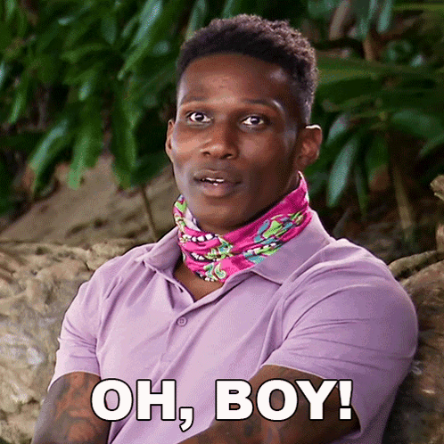 Man in Purple Shirt With Bandana Saying Oh Boy