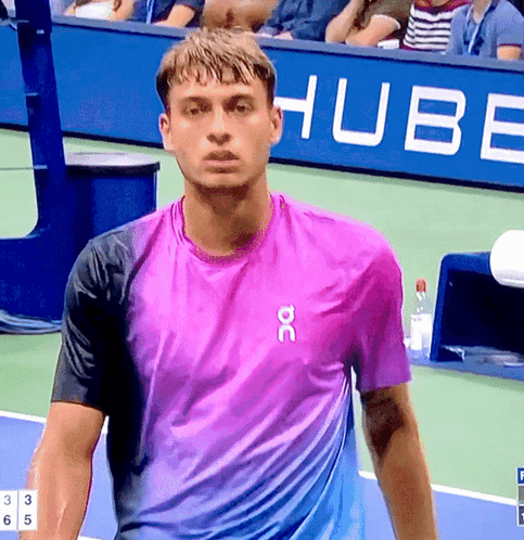 Man in Purple Shirt with DC