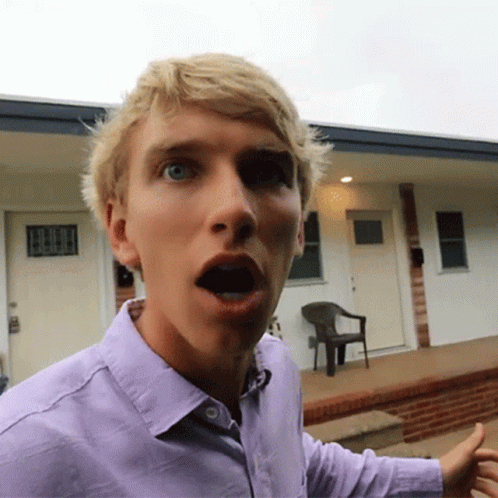 Man In Purple Shirt With Mouth Open GIF