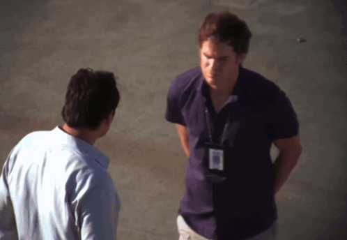 Man in Purple Shirt with Name Tag