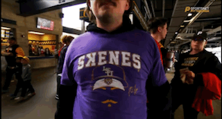 Man in Purple Shirt with Sxenees