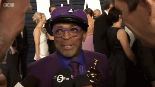 Man in Purple Suit and Hat Interviewed by BBC
