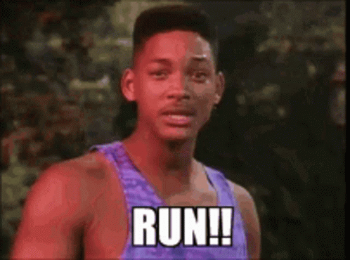Man in Purple Tank Top Saying Run
