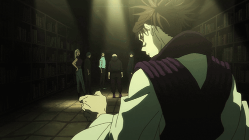 Man In Purple Vest In Dark Room With Others GIF