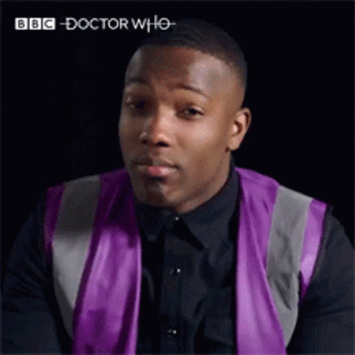 Man in Purple Vest Saying Sensational