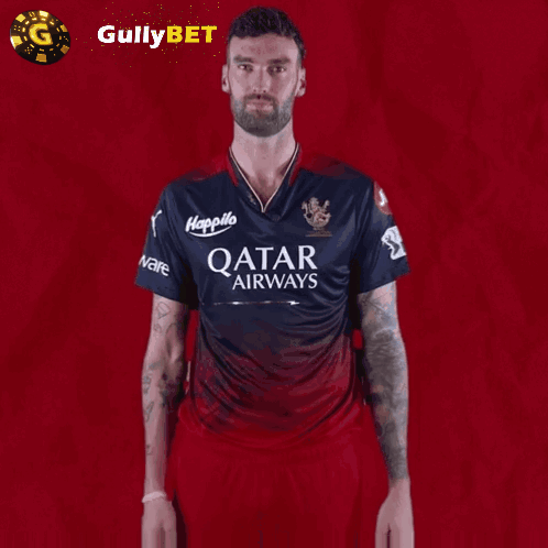 Man in Qatar Airways Jersey Making Funny Face