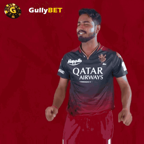 Man in Qatar Airways Shirt Holding Up Fingers