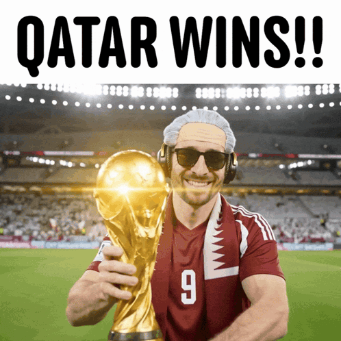 Man In Qatar Jersey Holding Trophy Says Qatar Wins GIF