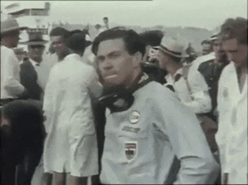 Man in Racing Shirt in Crowd