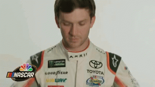 Man in Racing Suit NASCAR Sign