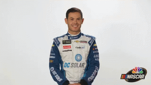Man in Racing Suit Says What