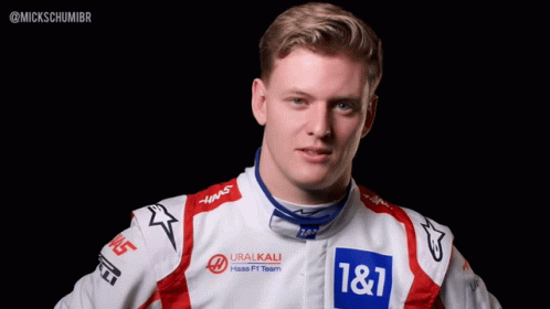 Man in Racing Suit with 1 & 1