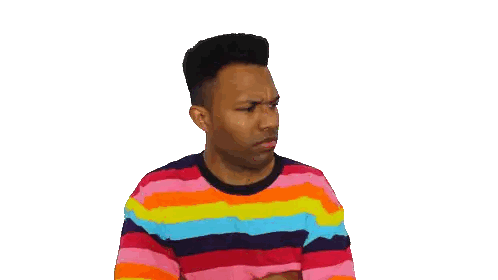 Man in Rainbow Striped Shirt Smiling