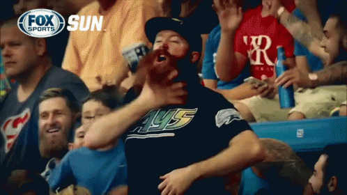 Man in Rays Shirt Screaming at Baseball Game