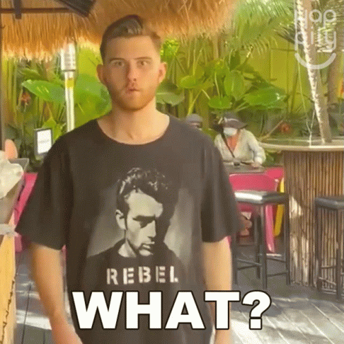Man in Rebel What T-Shirt at Bar