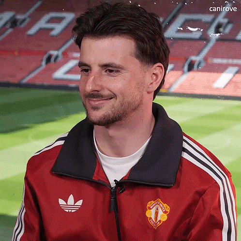 Man in Red Adidas Jacket Manchester United