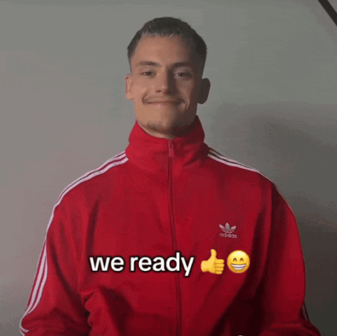 Man in Red Adidas Jacket Thumbs Up