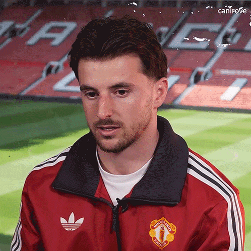 Man in Red Adidas Jacket With Man United Logo