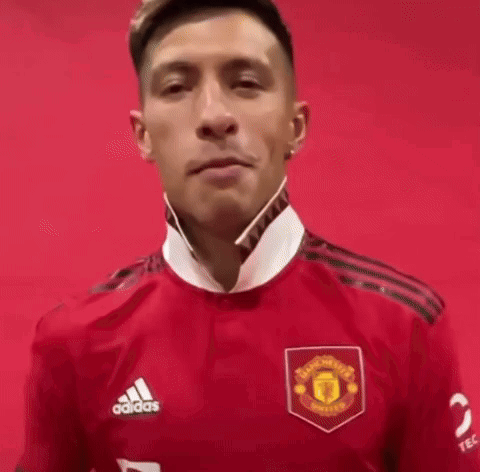 Man in Red Adidas Jersey Making Face