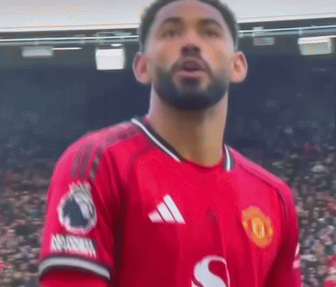 Man in Red Adidas Jersey with S